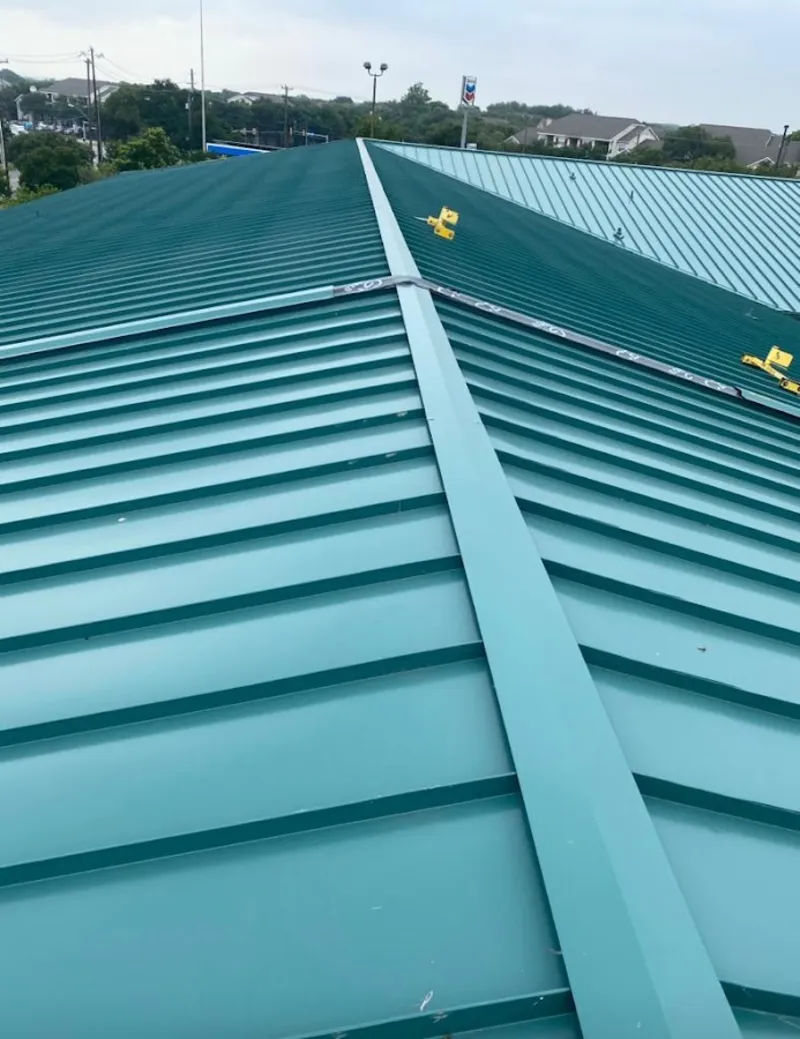 Green commercial metal roof ridge and valley for Metal Roof Repair in Church Hill